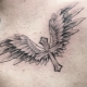 Разноликост тетоважа у облику крила на леђима за мушкарце